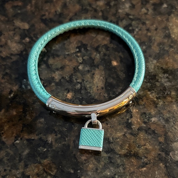 Michael Kors Jewelry - Michael Kors Turquoise and Silver Bracelet with Padlock Charm